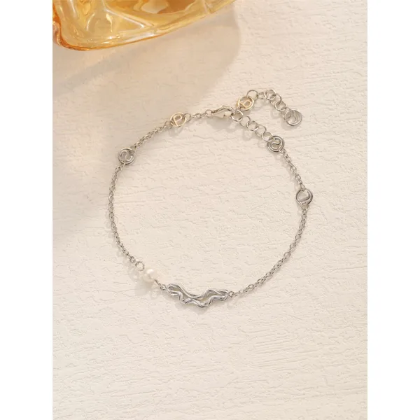 Butti armbånd i sølv i sterlingsølv fra Spinning Jewelry