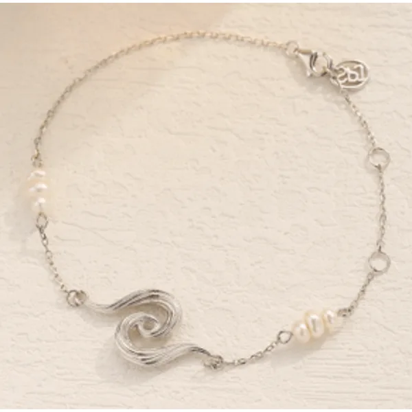 Waves armbånd i sterlingsølv fra Spinning Jewelry