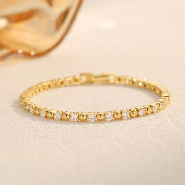Infinity Sparkling armbånd i forgyldt sølv fra Spinning Jewelry